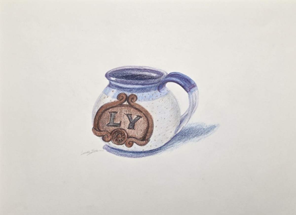 Colored pencil drawing of a small blue and cream teacup resting on white paper.